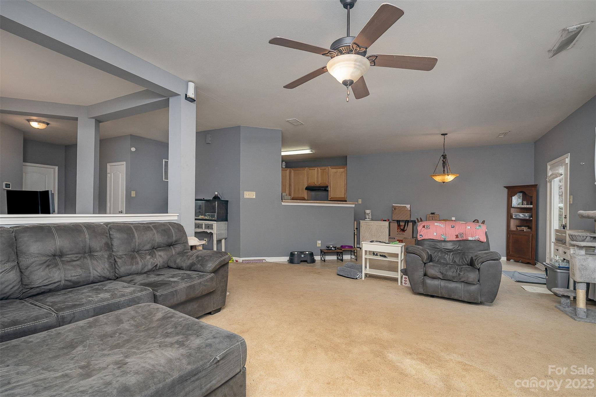 2070 Durand Road Fort Mill, SC 29715 - Photo 9 of 28 a living room with furniture and a flat screen tv