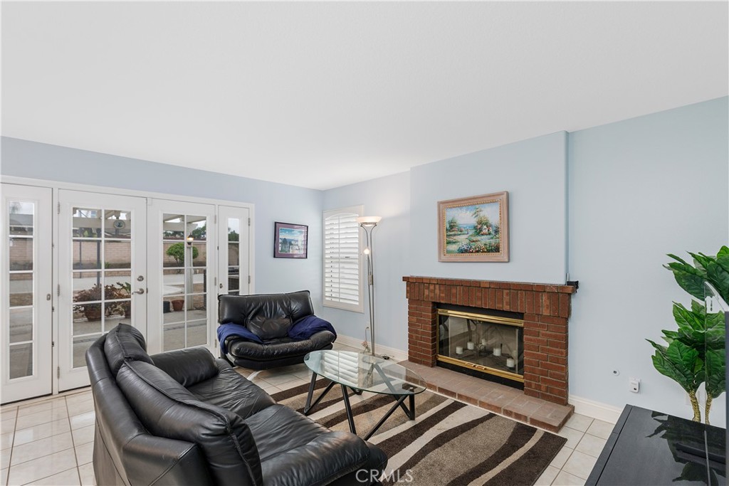 1874 Natalie Lane Riverside, CA 92506 - Photo 14 of 40 a living room with furniture and a fireplace