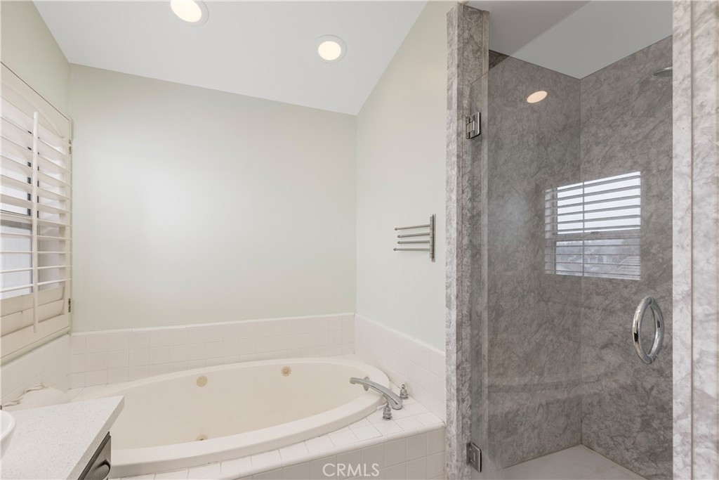 1874 Natalie Lane Riverside, CA 92506 - Photo 27 of 40 a white bath tub sitting next to a shower