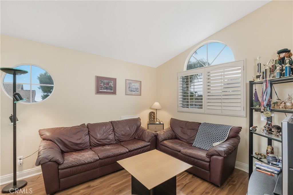 1874 Natalie Lane Riverside, CA 92506 - Photo 29 of 40 a living room with furniture and a wooden floor