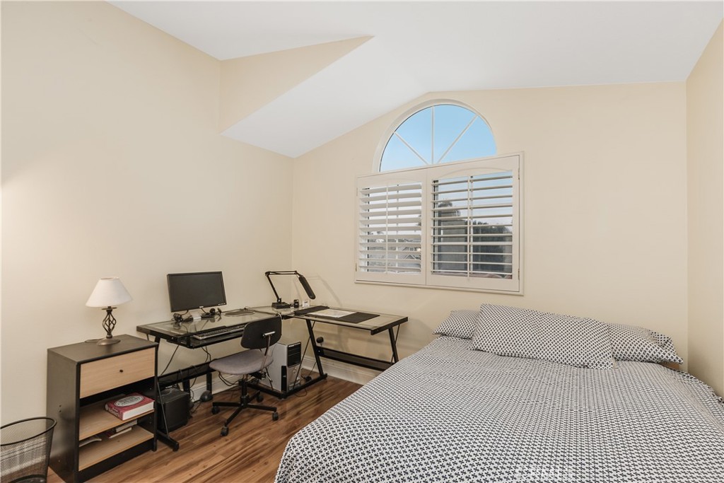 1874 Natalie Lane Riverside, CA 92506 - Photo 30 of 40 a bedroom with a bed and a window