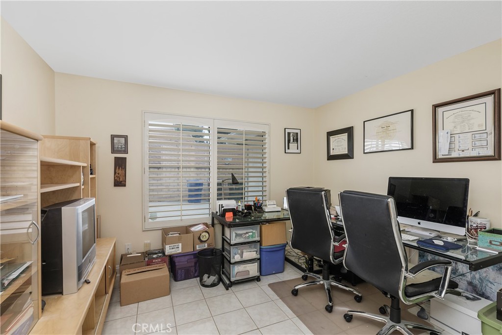 1874 Natalie Lane Riverside, CA 92506 - Photo 32 of 40 a view of a workspace with furniture and a window