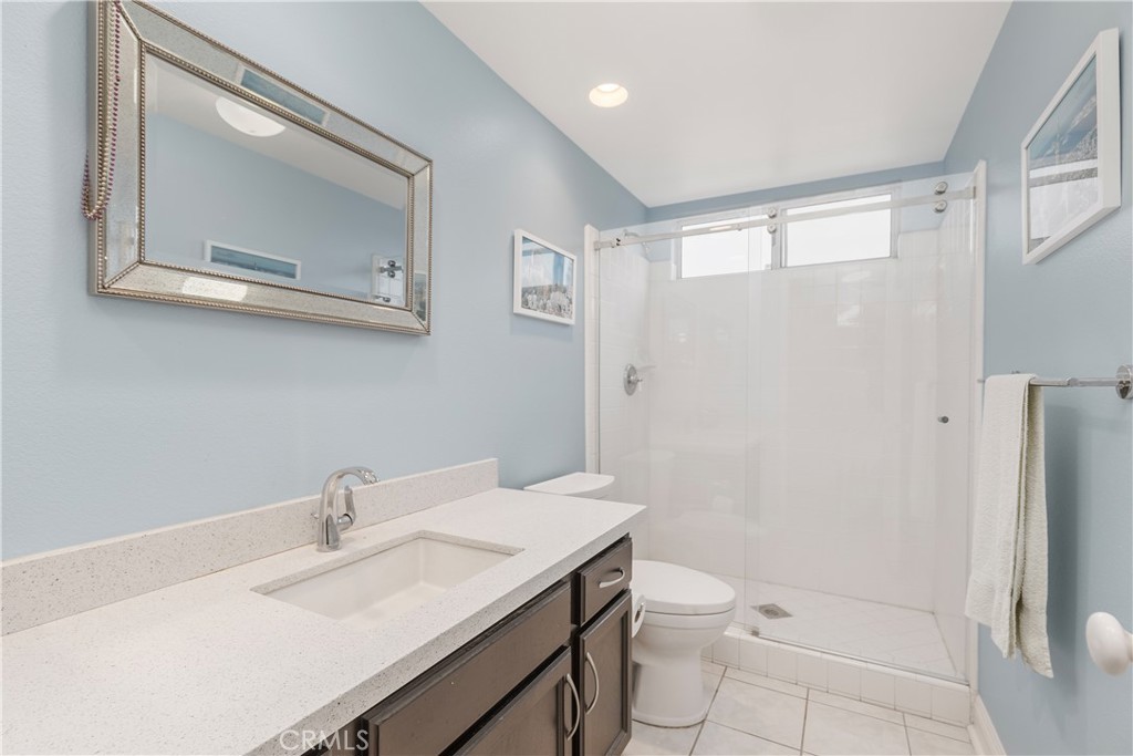 1874 Natalie Lane Riverside, CA 92506 - Photo 33 of 40 a bathroom with a granite countertop sink toilet and shower