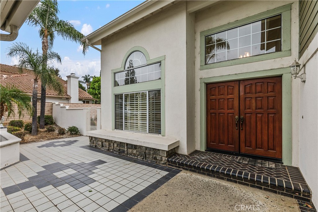 1874 Natalie Lane Riverside, CA 92506 - Photo 6 of 40 a front view of a house with a yard