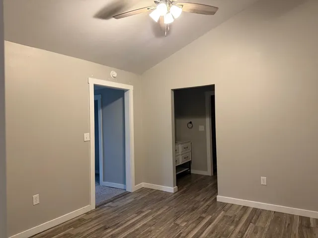 a view of a livingroom with wooden floor