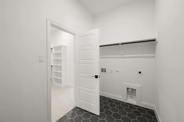 a bathroom with a glass door shower