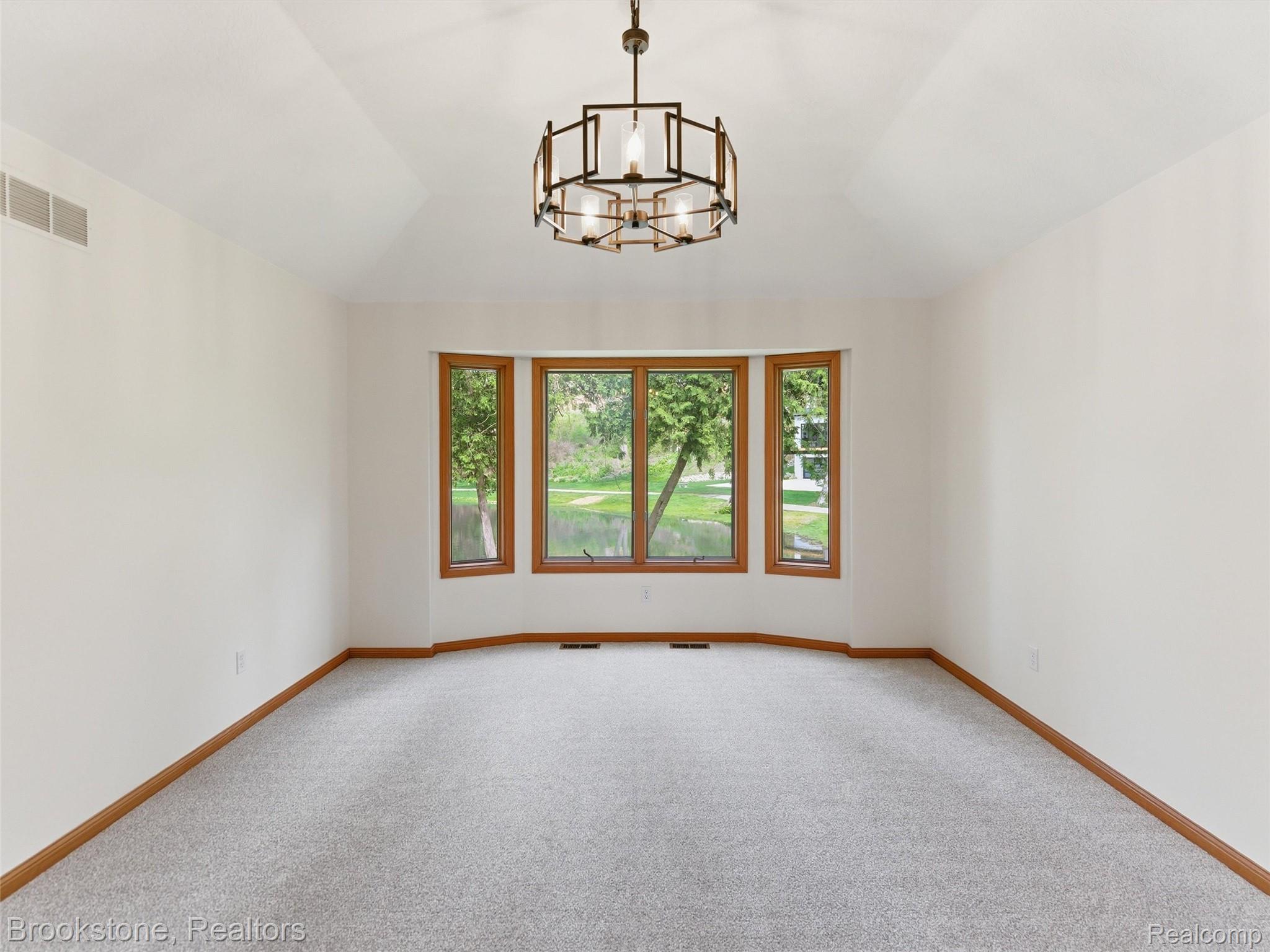 6512 White Lake Road Clarkston, MI 48346 - Photo 29 of 69 Primary Bedroom with Vaulted Ceilings