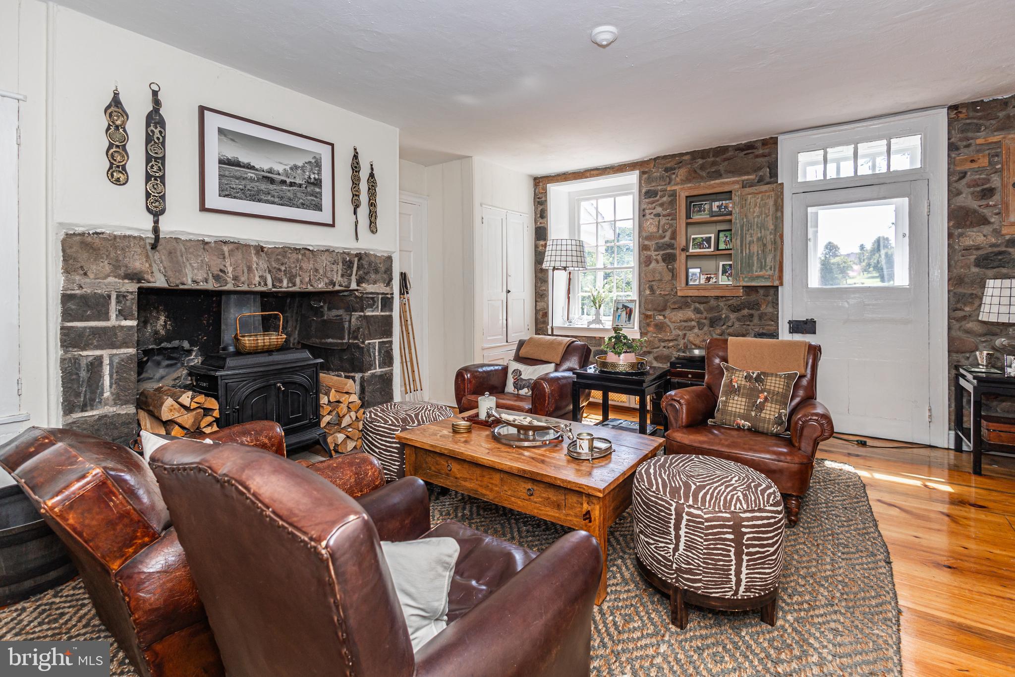 439 Brownsburg Road, Unit W Newtown, PA 18940 - Photo 11 of 68 a living room with furniture and a fireplace