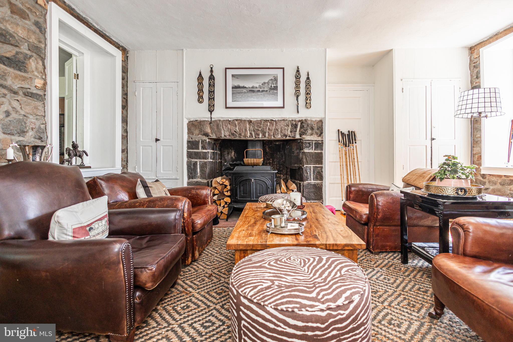 439 Brownsburg Road, Unit W Newtown, PA 18940 - Photo 12 of 68 a living room with furniture and a fireplace