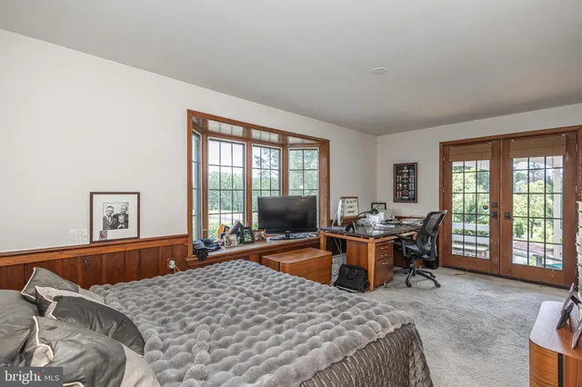 a kitchen with stainless steel appliances granite countertop a sink and a refrigerator