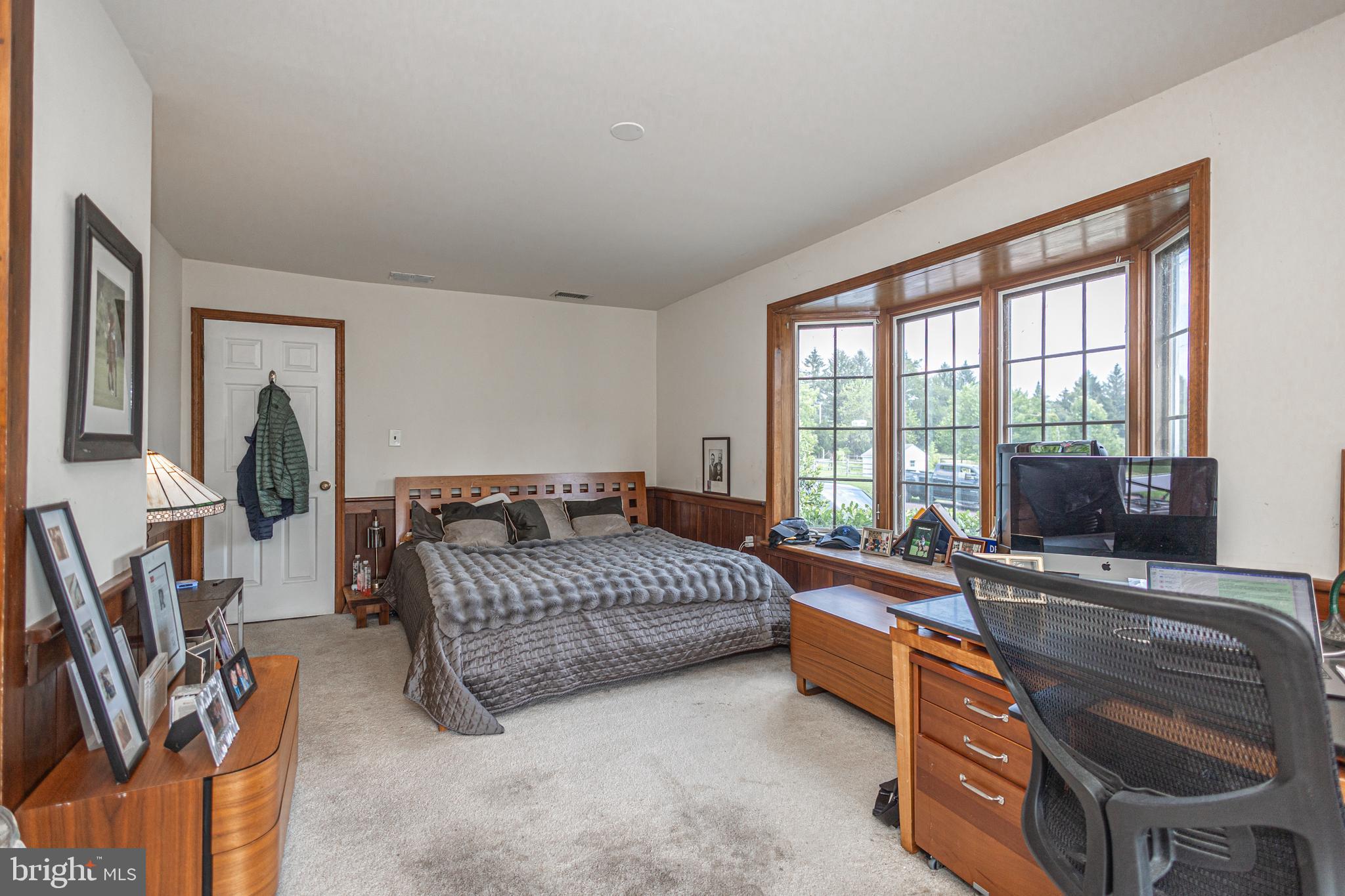 439 Brownsburg Road, Unit W Newtown, PA 18940 - Photo 16 of 68 a bedroom with furniture and a flat screen tv