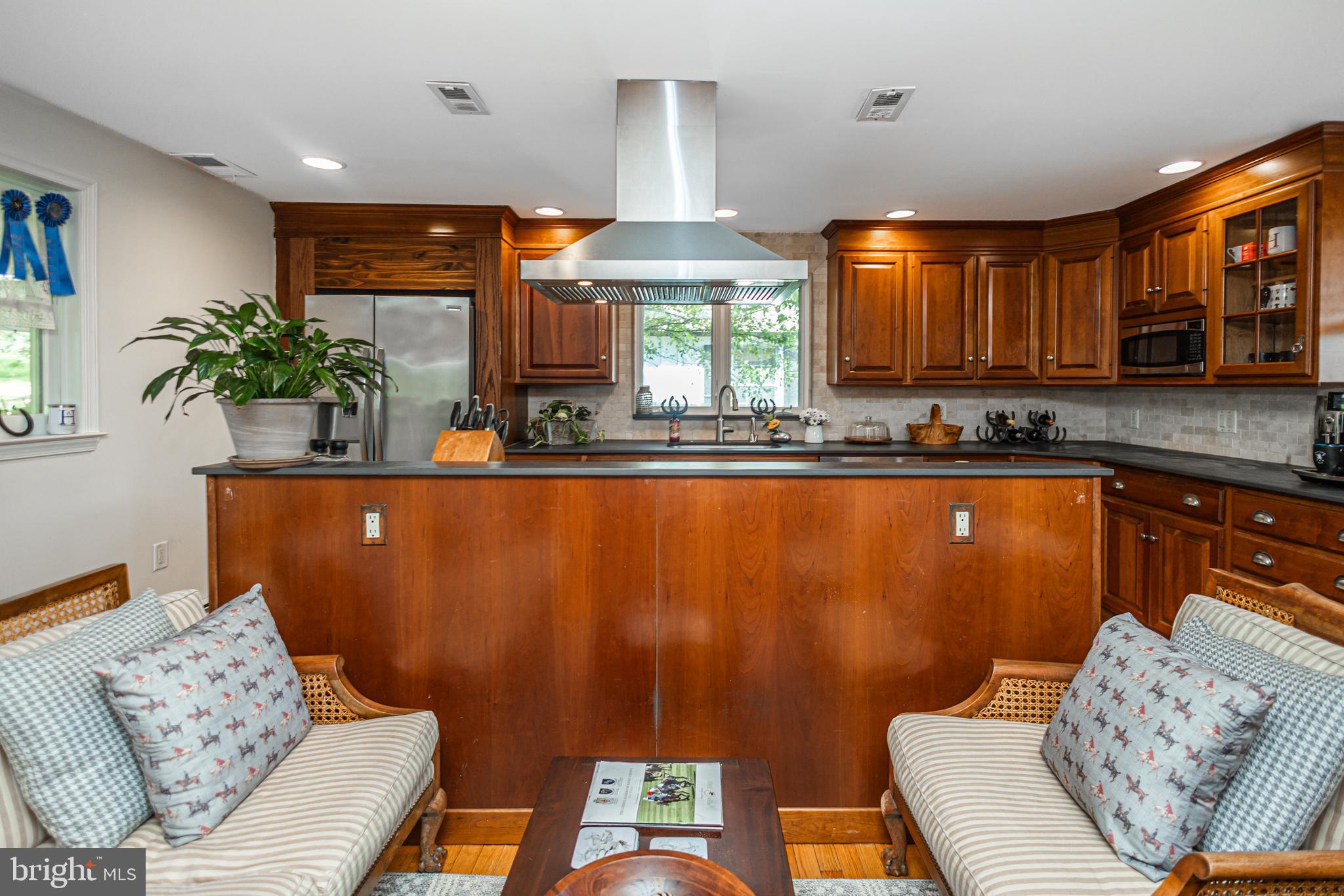 439 Brownsburg Road, Unit W Newtown, PA 18940 - Photo 18 of 68 a kitchen with stainless steel appliances granite countertop a sink and a refrigerator