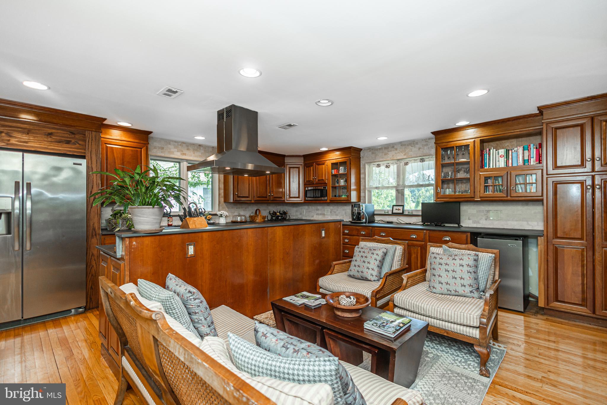 439 Brownsburg Road, Unit W Newtown, PA 18940 - Photo 19 of 68 a living room with furniture and a kitchen view