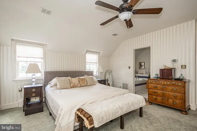 a dining room with furniture window and outside view