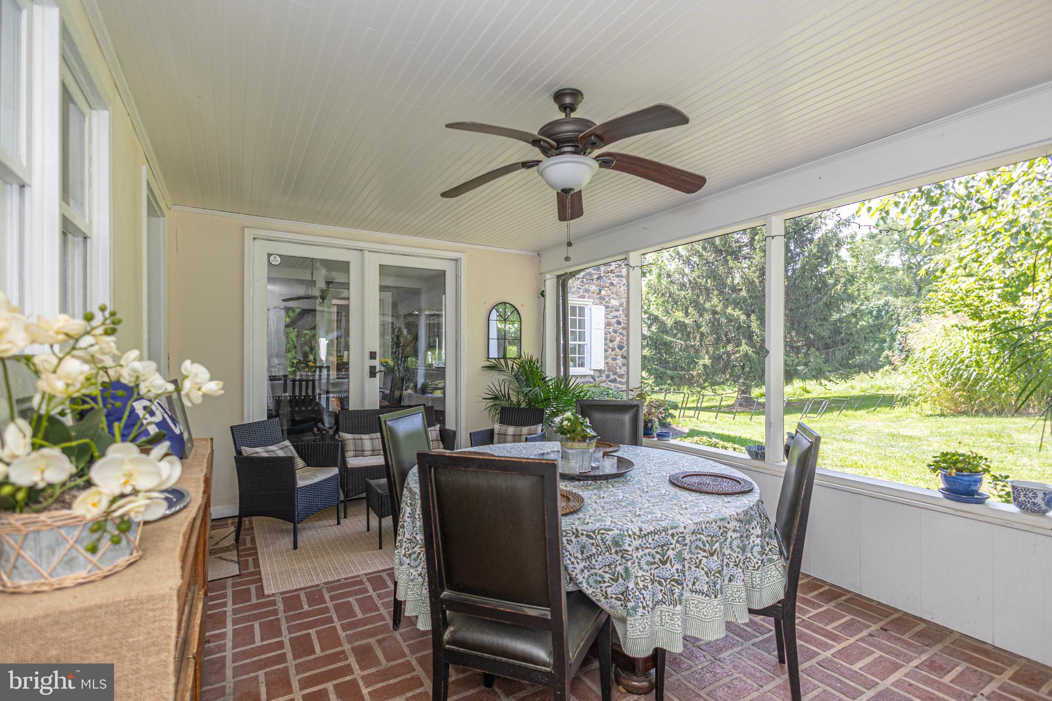 439 Brownsburg Road, Unit W Newtown, PA 18940 - Photo 37 of 68 a view of a dining room with furniture window and outside view