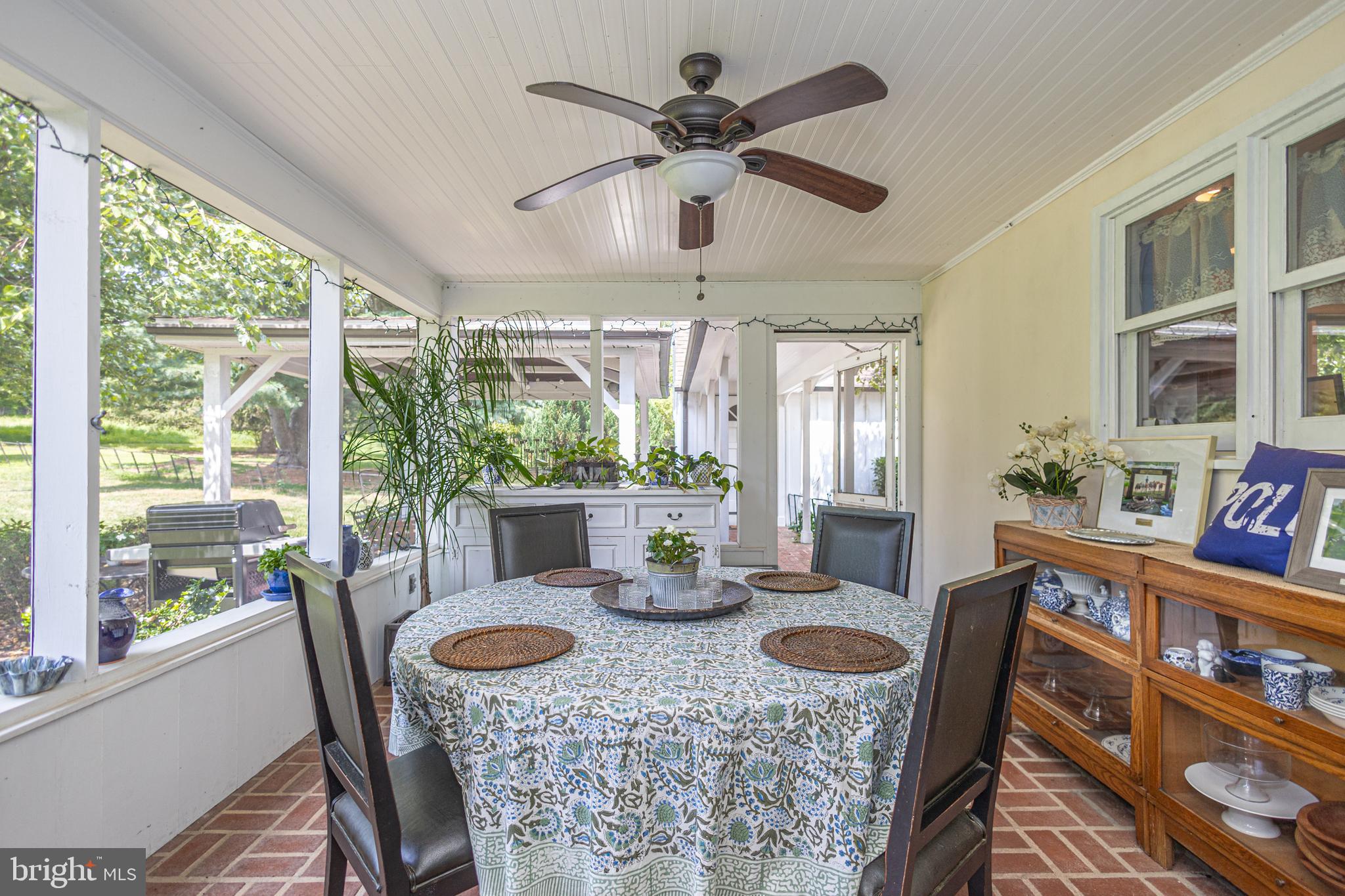 439 Brownsburg Road, Unit W Newtown, PA 18940 - Photo 38 of 68 a view of a dining room with furniture window and outside view