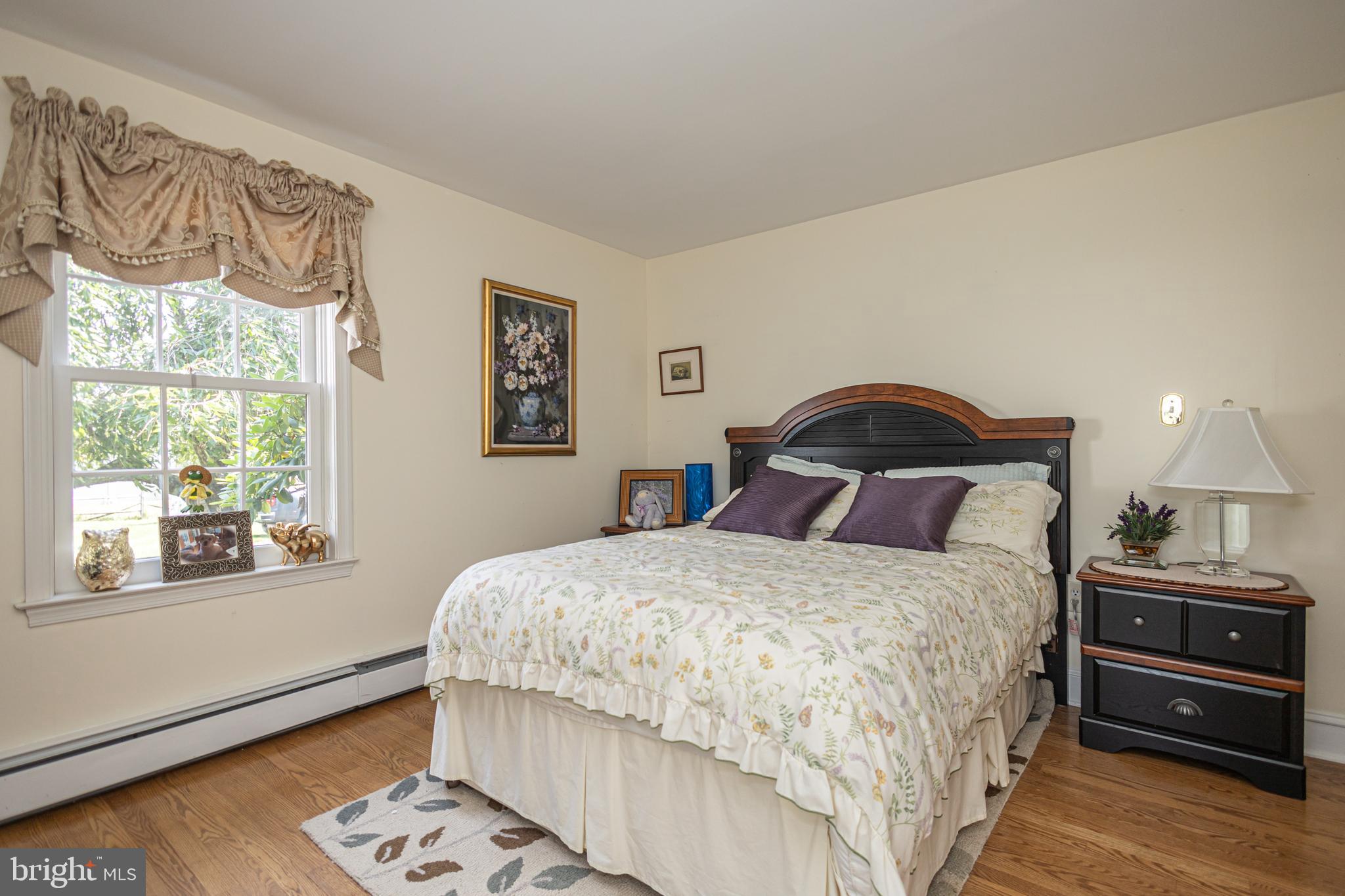 439 Brownsburg Road, Unit W Newtown, PA 18940 - Photo 51 of 68 a bedroom with a bed and a window