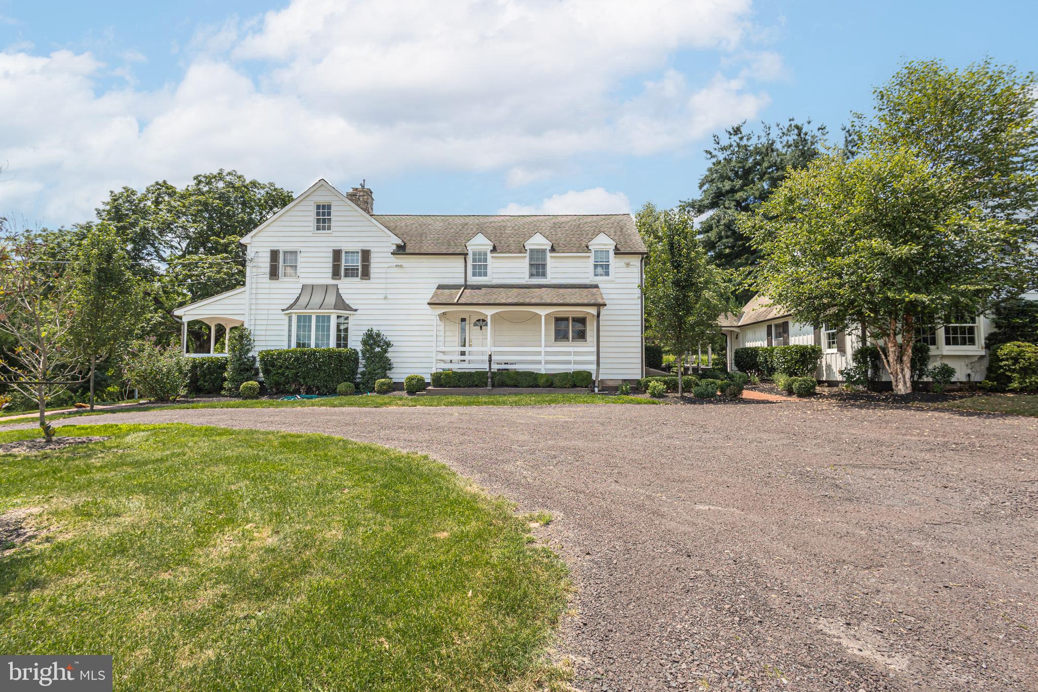 439 Brownsburg Road, Unit W Newtown, PA 18940 - Photo 57 of 68 a front view of a house with a yard