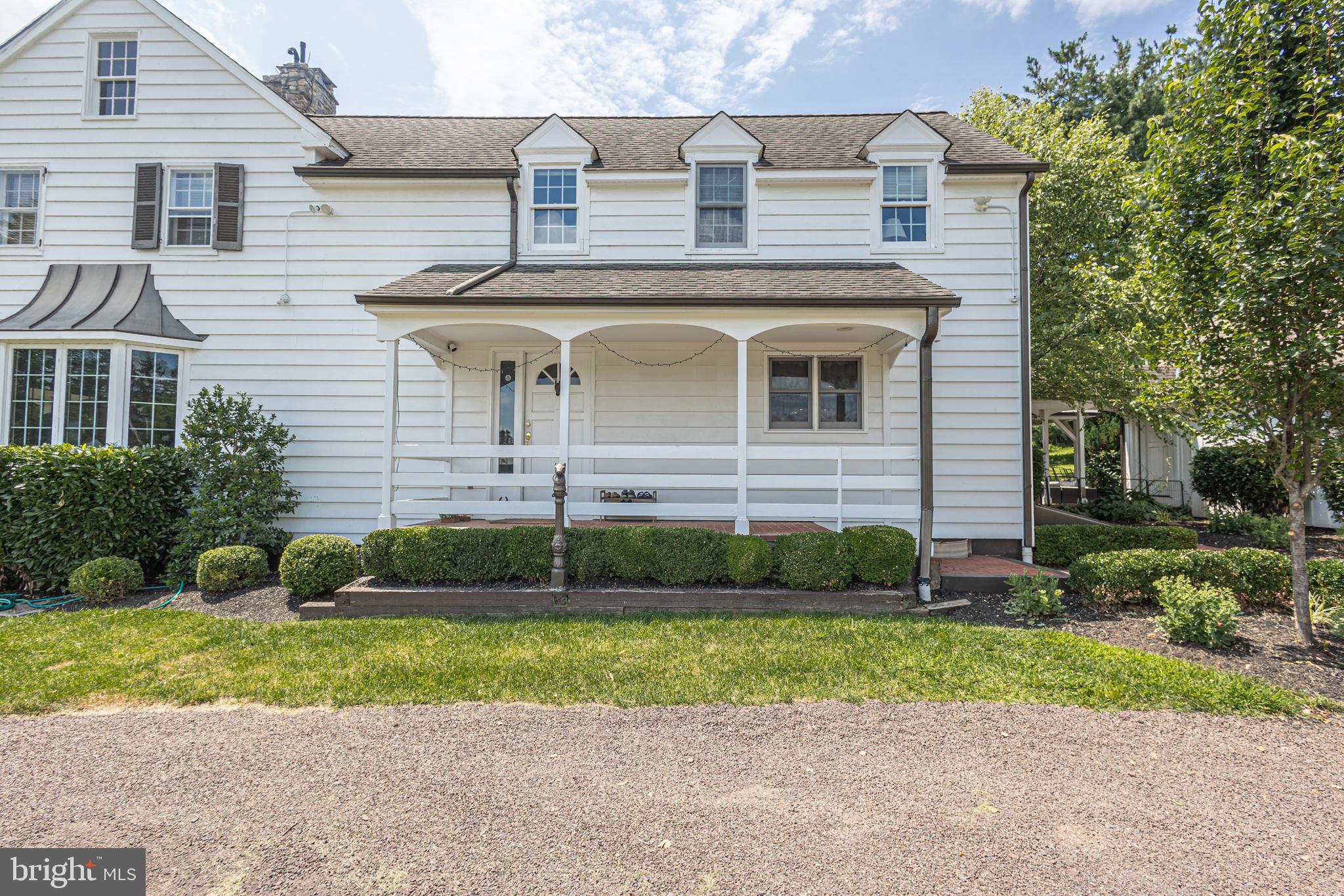 439 Brownsburg Road, Unit W Newtown, PA 18940 - Photo 58 of 68 a front view of a house with a yard