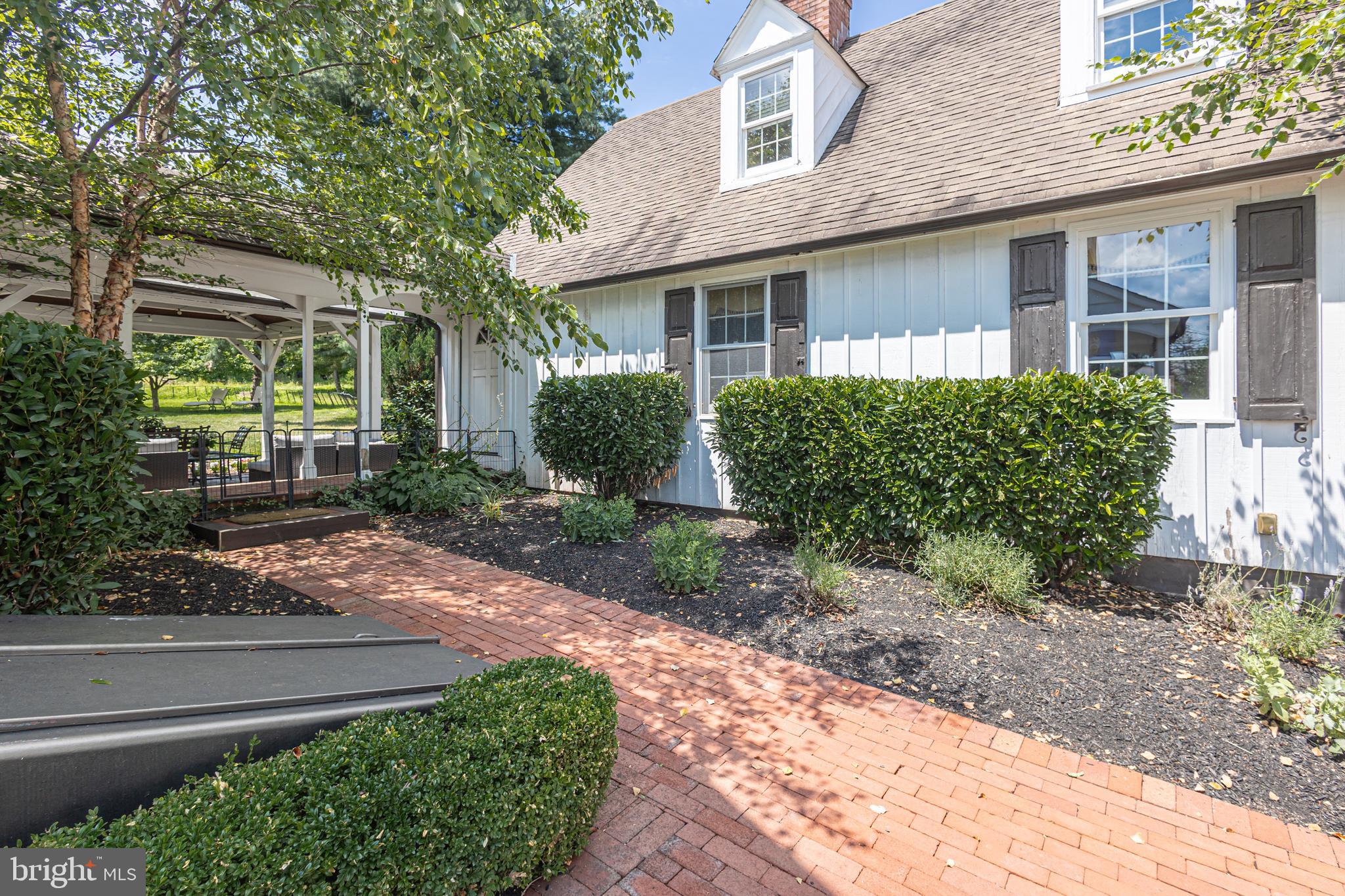 439 Brownsburg Road, Unit W Newtown, PA 18940 - Photo 59 of 68 a front view of a house with garden
