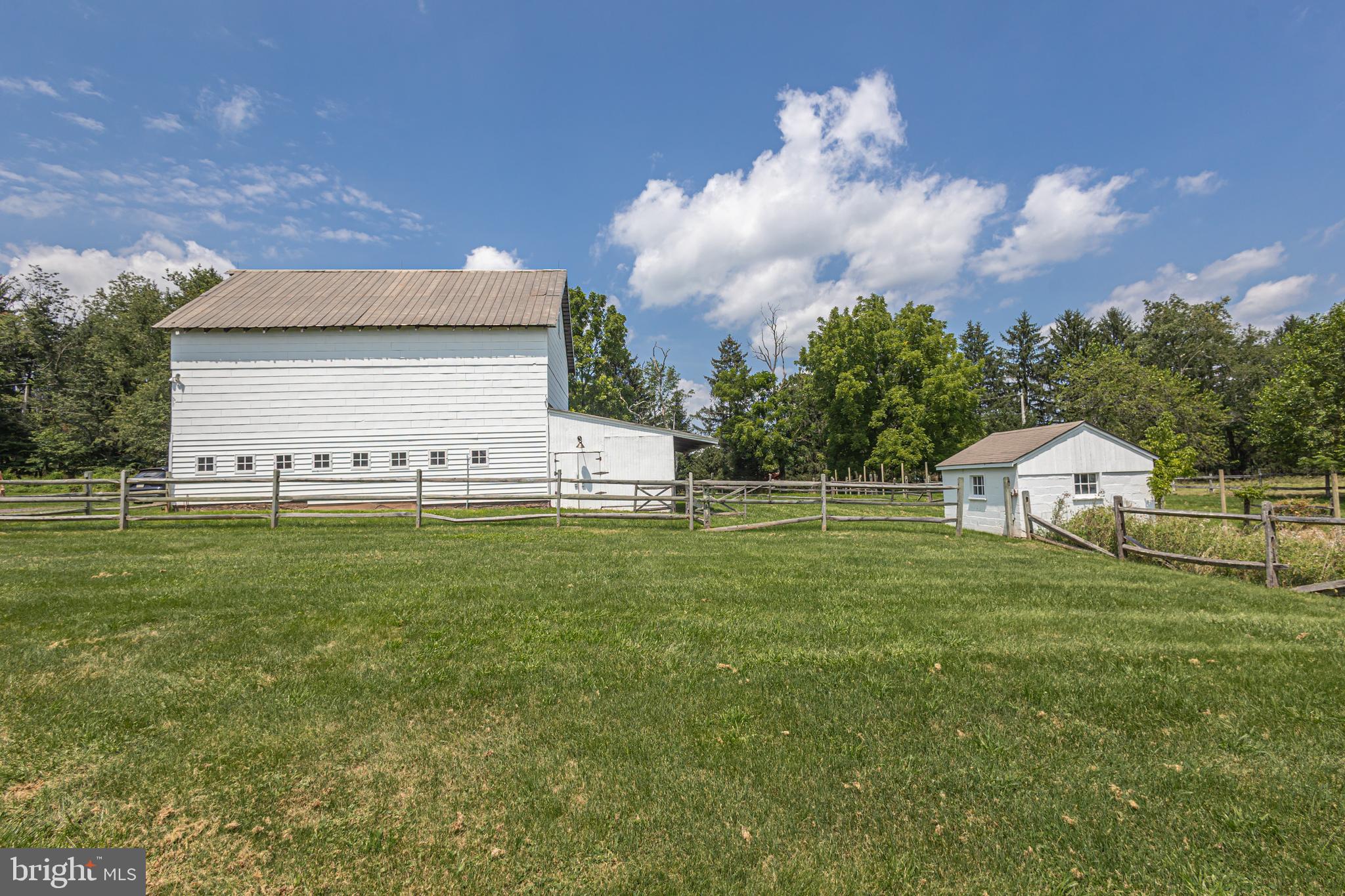 439 Brownsburg Road, Unit W Newtown, PA 18940 - Photo 64 of 68 a view of a house with a yard
