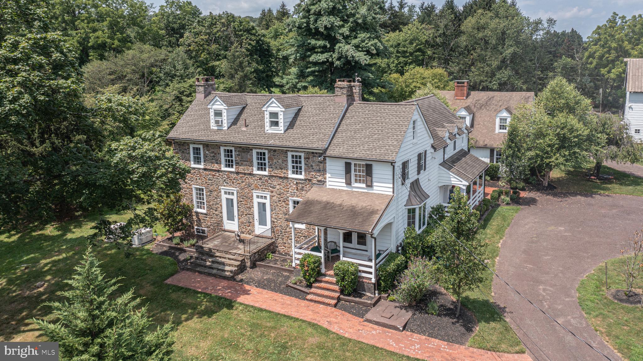 439 Brownsburg Road, Unit W Newtown, PA 18940 - Photo 67 of 68 an aerial view of a house with yard and green space