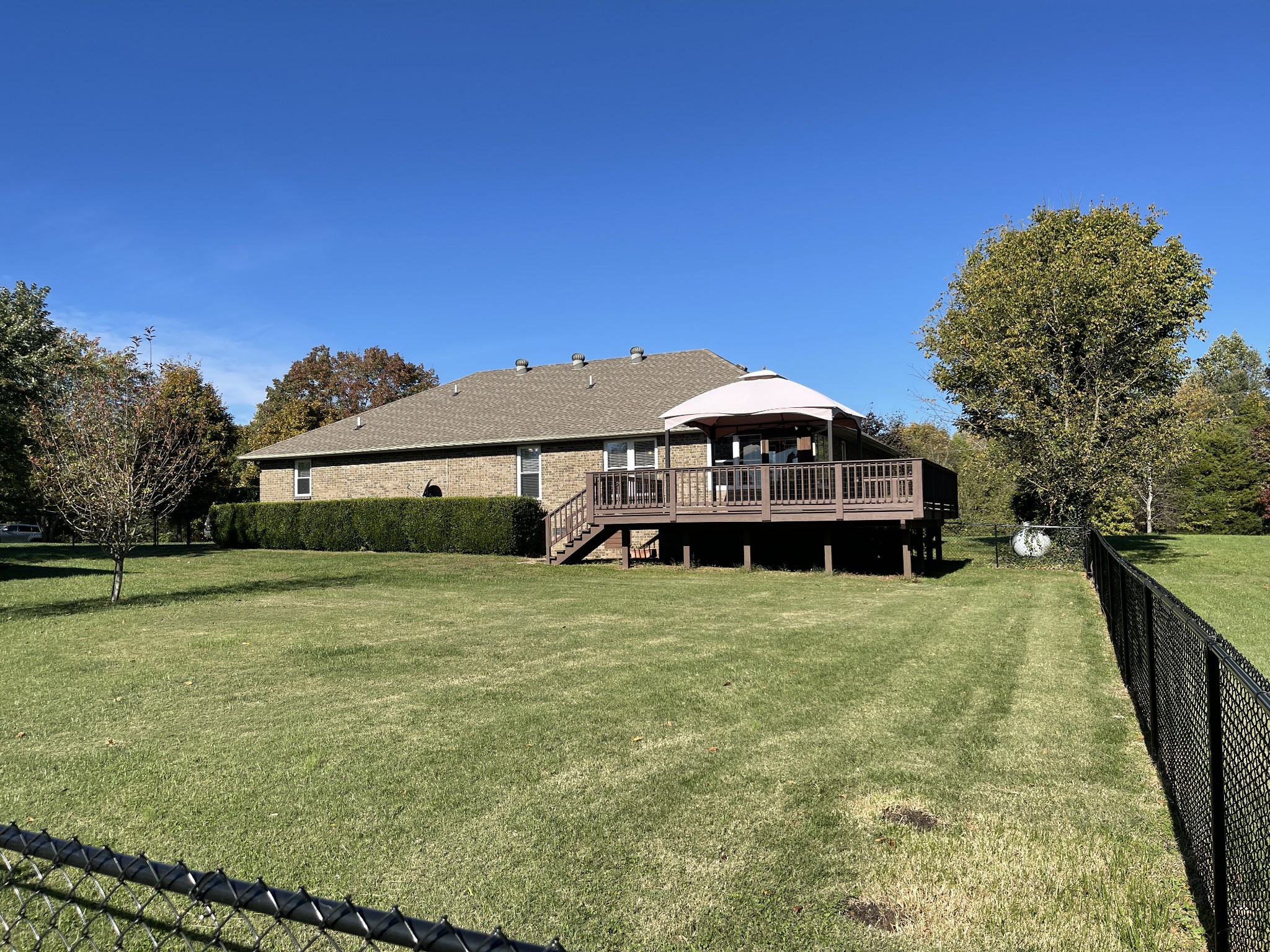 2946 Old Clarksville Sprgfld Road Adams, TN 37010 - Photo 21 of 24 a front view of a house with a yard