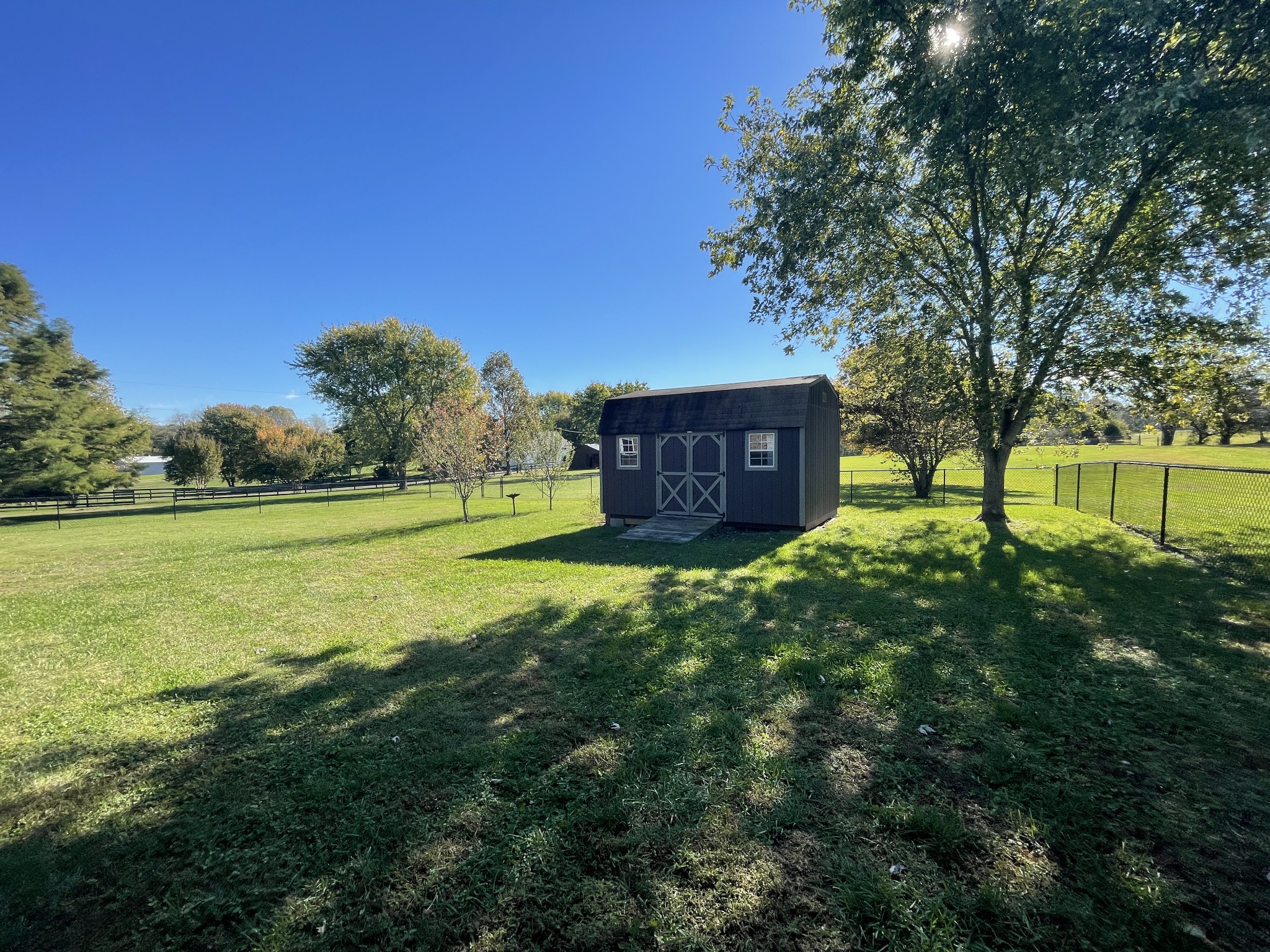 2946 Old Clarksville Sprgfld Road Adams, TN 37010 - Photo 24 of 24 a view of a house with a yard