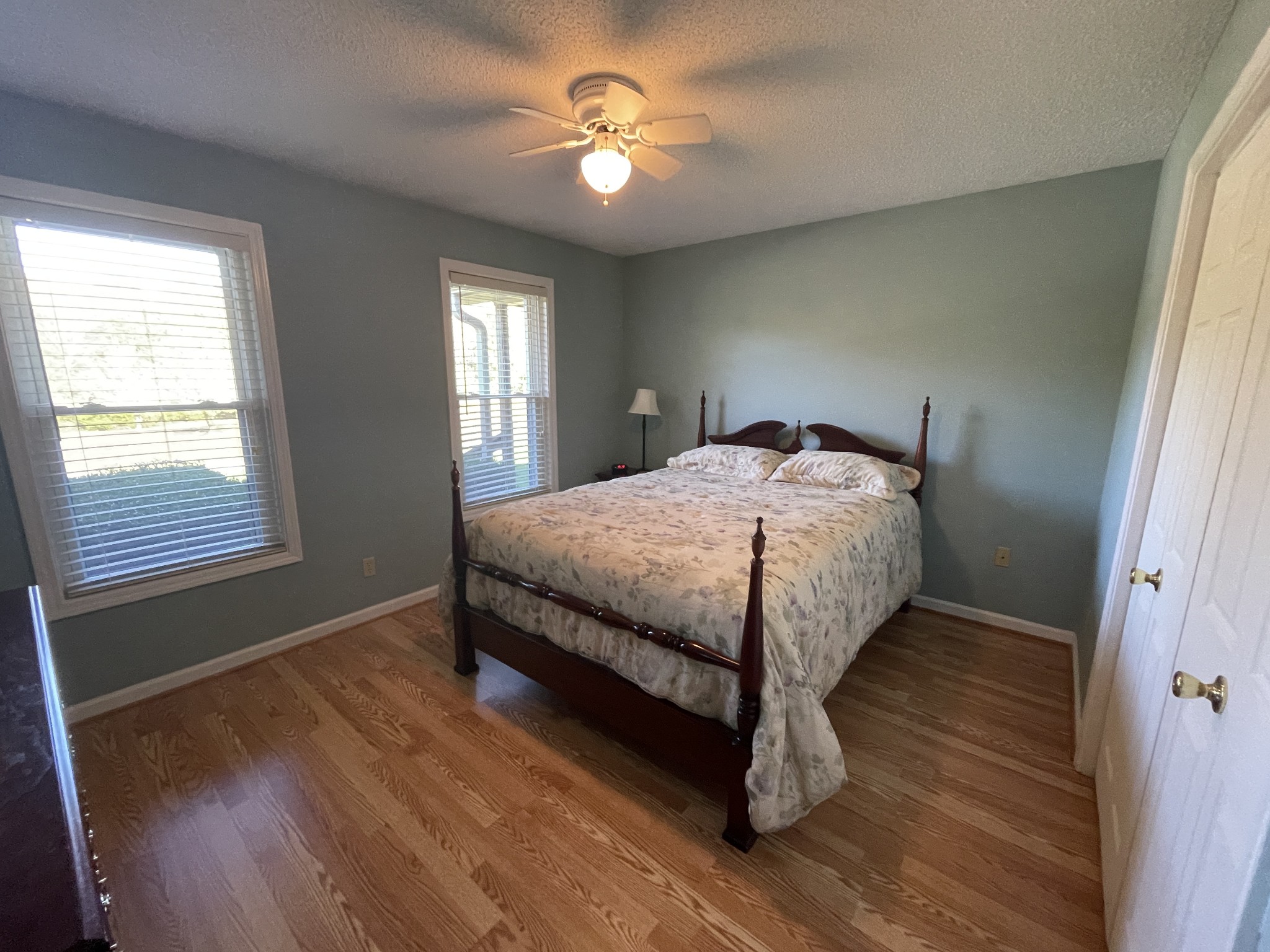 2946 Old Clarksville Sprgfld Road Adams, TN 37010 - Photo 8 of 24 a bedroom with a bed and a chandelier