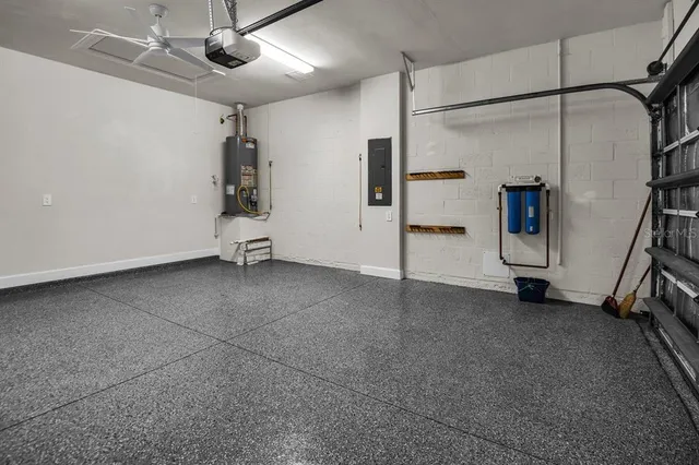 an aerial view of a house with outdoor space