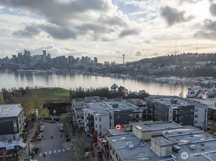 a view of a lake with outside a city