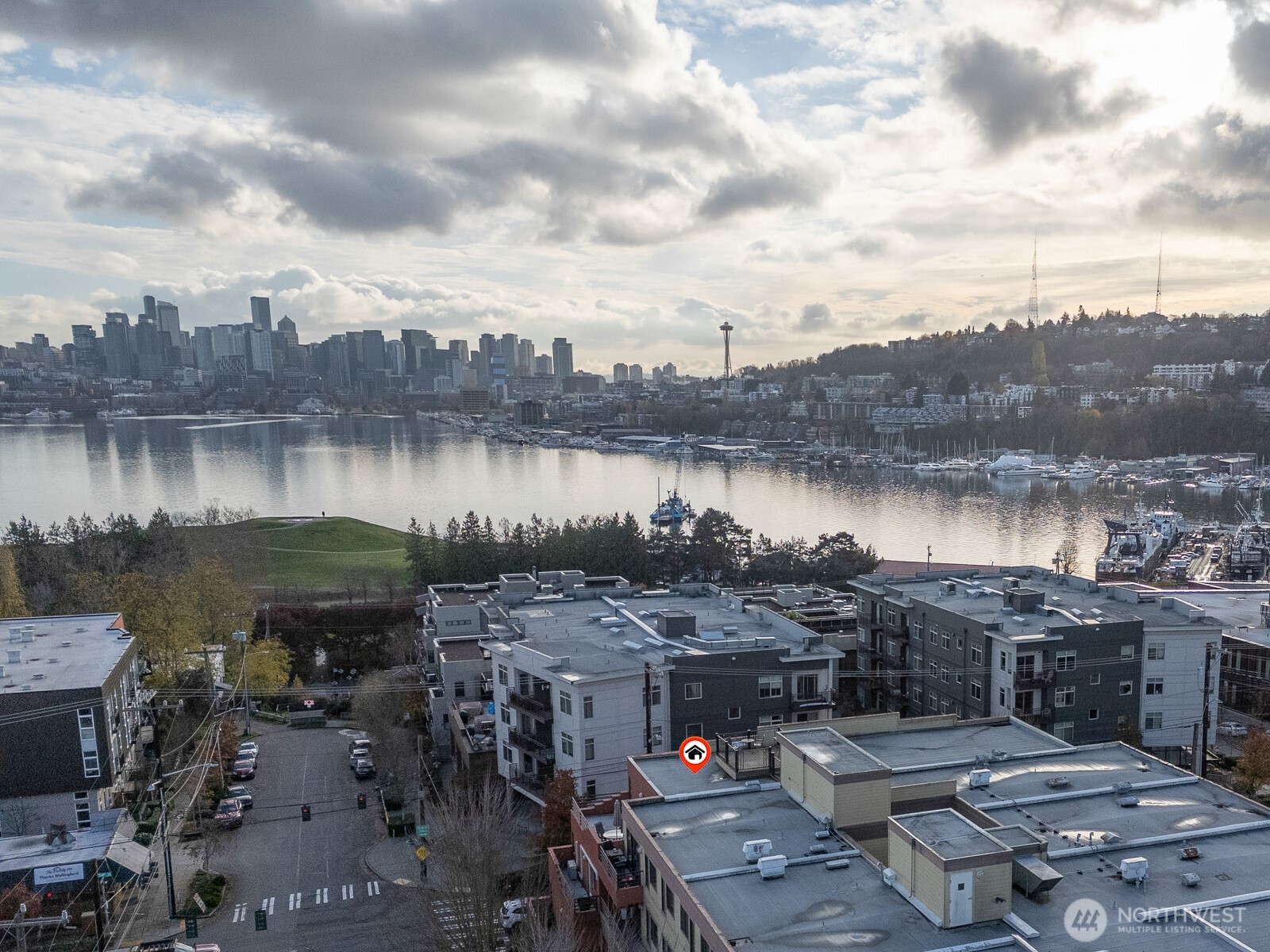 3401 Wallingford Avenue North, Unit 408 Seattle, WA 98103 - Photo 12 of 15 a view of a lake with outside a city