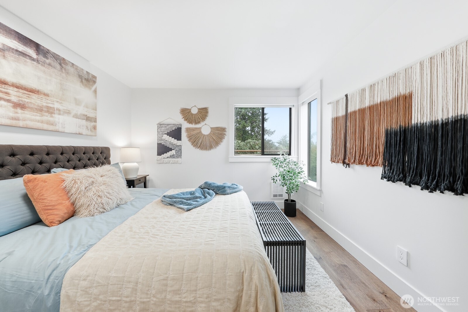 3401 Wallingford Avenue North, Unit 408 Seattle, WA 98103 - Photo 10 of 15 a bedroom with bed and window