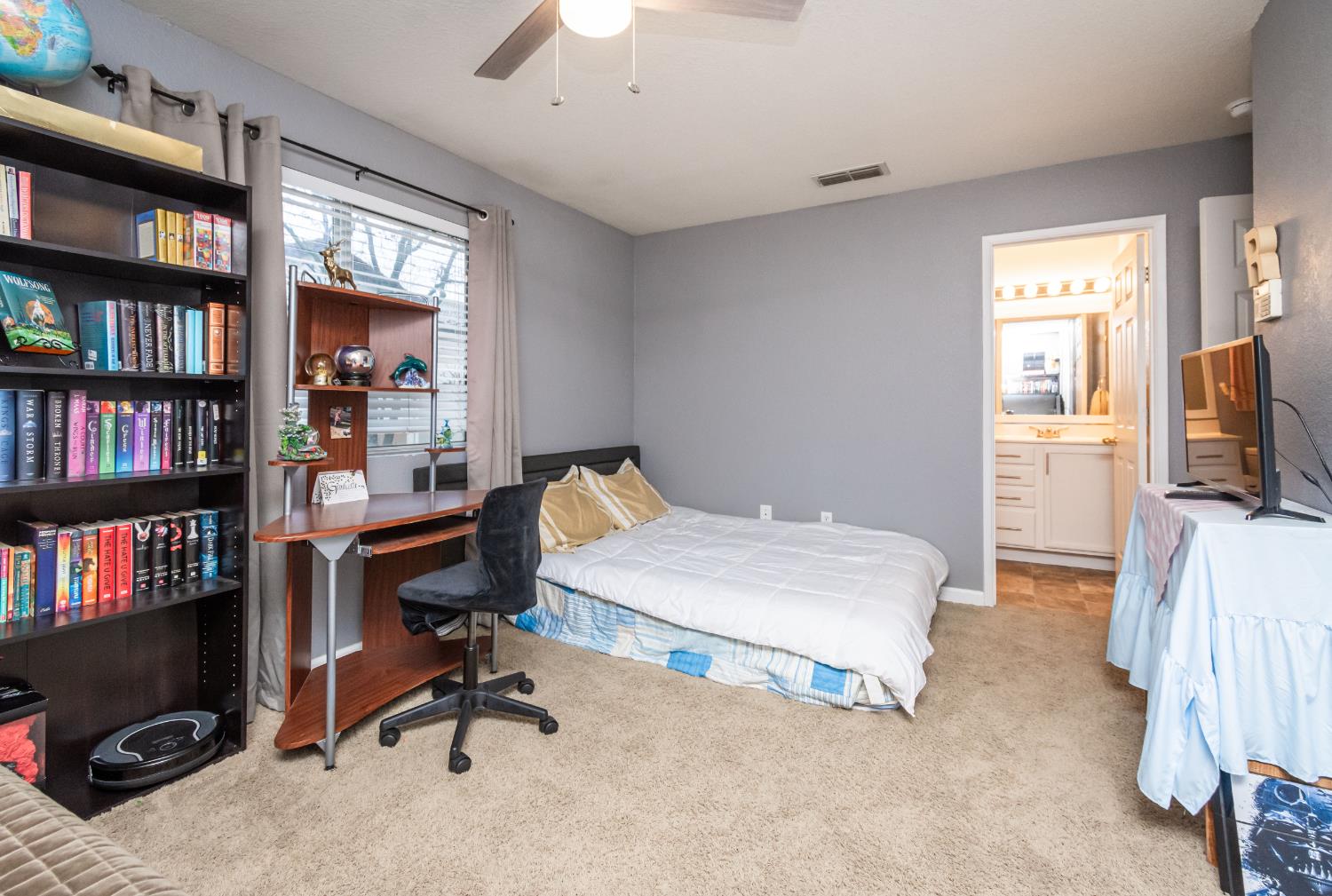 8020 Walerga Road, Unit 1238 Antelope, CA 95843 - Photo 11 of 22 a workspace with furniture bookshelf and a window