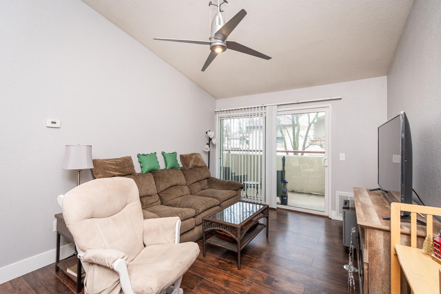 8020 Walerga Road, Unit 1238 Antelope, CA 95843 - Photo 18 of 22 a living room with furniture a ceiling fan and a window