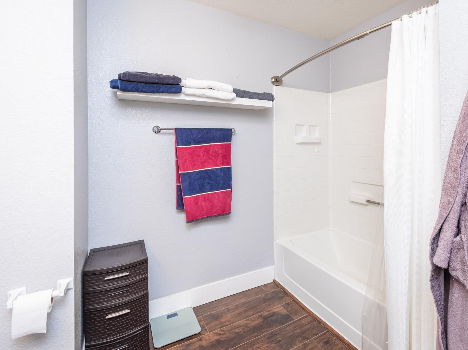 8020 Walerga Road, Unit 1238 Antelope, CA 95843 - Photo 8 of 22 a bathroom with a bathtub and a shower