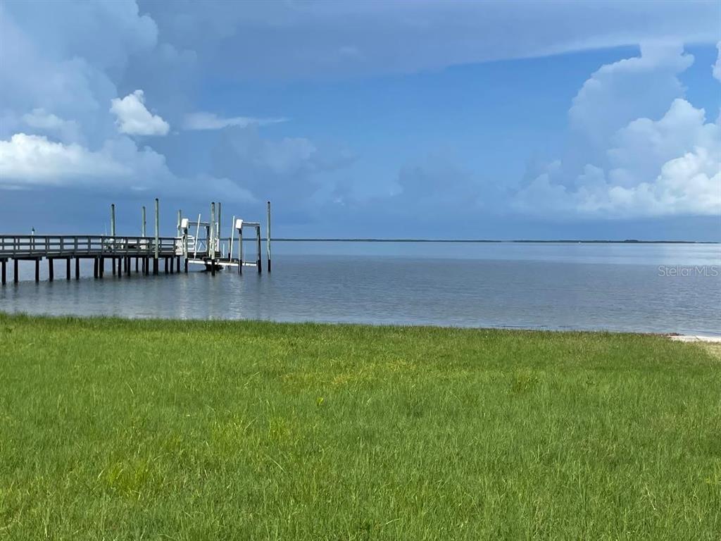 0 Bluff Holiday Holiday, FL 34691 - Photo 8 of 10 a view of yard with swimming pool and seating