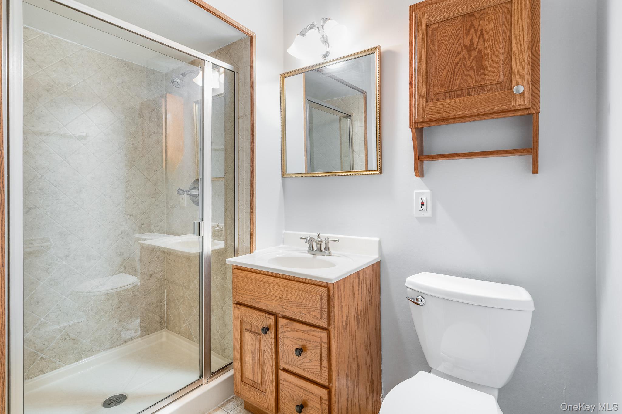 902 Commons Way, Unit F Fishkill, NY 12524 - Photo 17 of 21 a bathroom with a sink toilet and shower