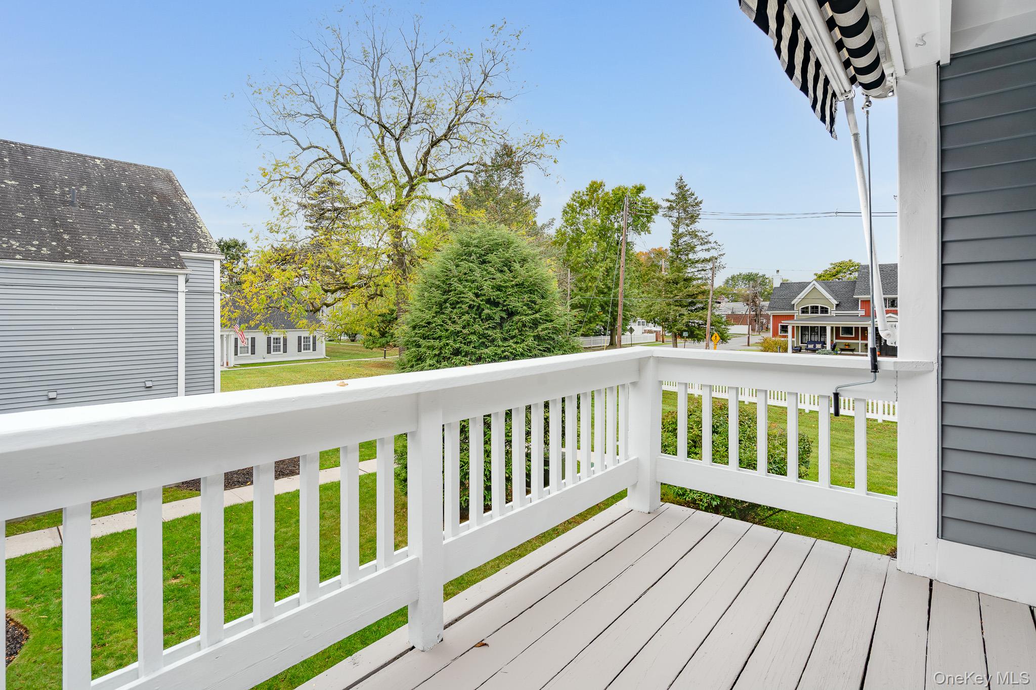 902 Commons Way, Unit F Fishkill, NY 12524 - Photo 19 of 21 a view of balcony with wooden floor