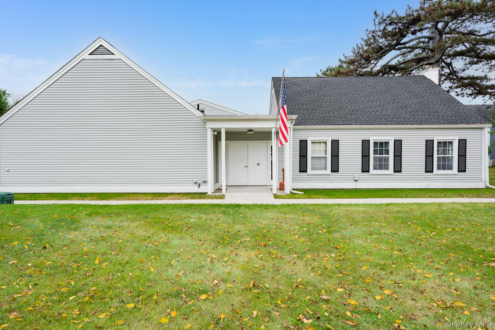 902 Commons Way, Unit F Fishkill, NY 12524 - Photo 20 of 21 a front view of a house with a yard