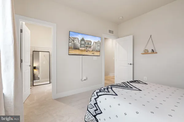 a view of a patio with a table and chairs