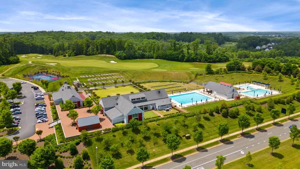 a view of a golf course with a lake