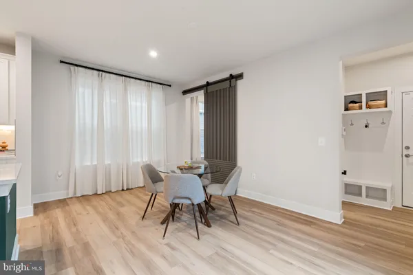 a living room with furniture and window