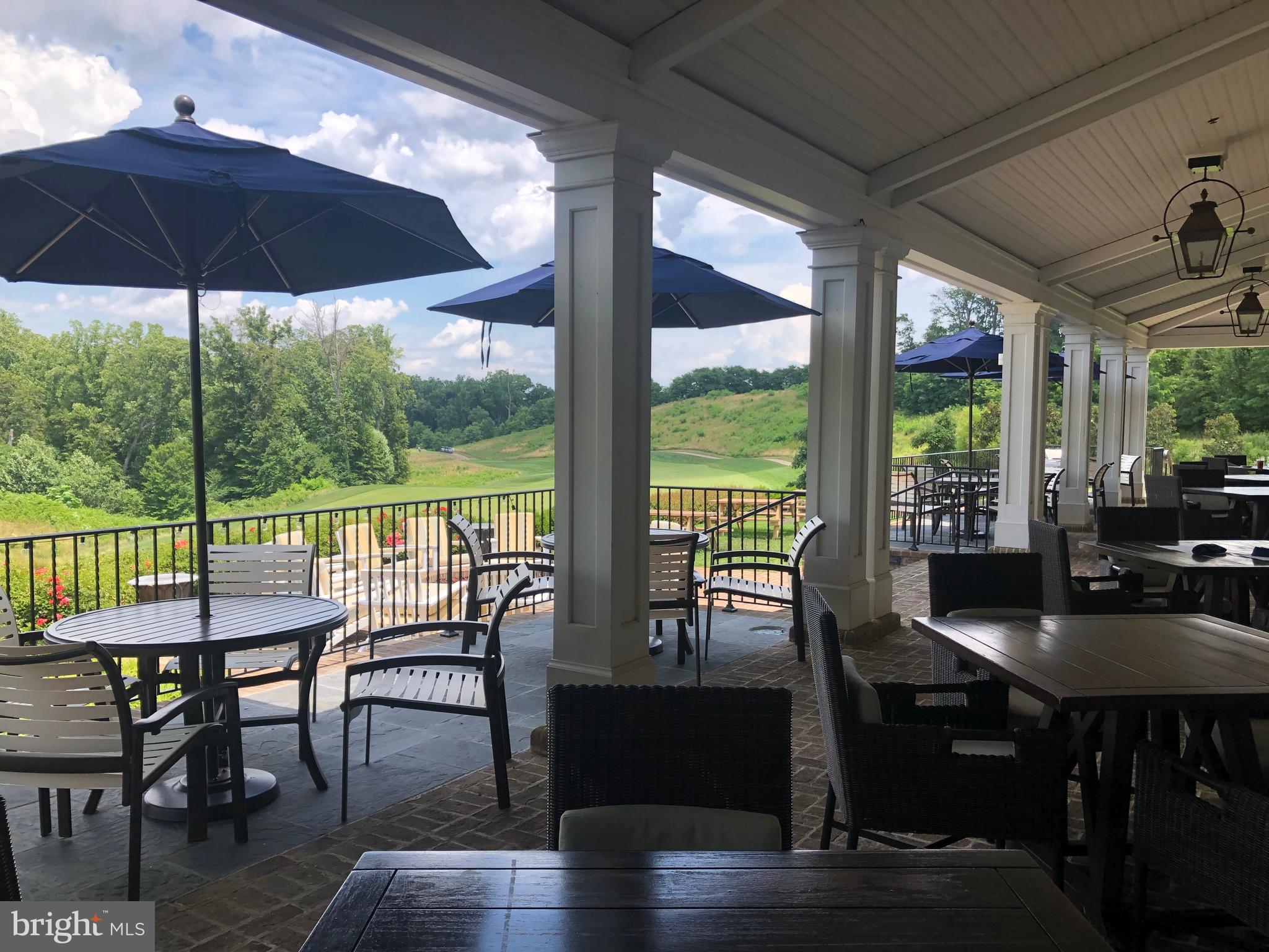 1924 Serviceberry Road Dumfries, VA 22026 - Photo 73 of 86 Patio dining with view of golf course