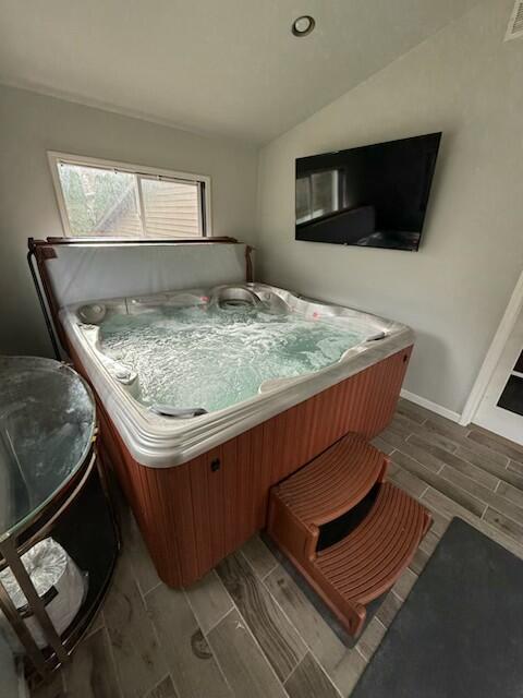 6747 West 450 Road North Michigan City, IN 46360 - Photo 23 of 37 a bedroom with a bed and flat screen tv