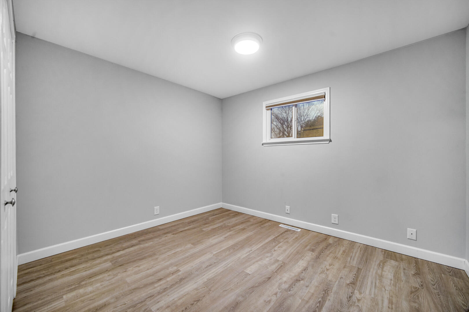 6747 West 450 Road North Michigan City, IN 46360 - Photo 29 of 37 a view of empty room with wooden floor