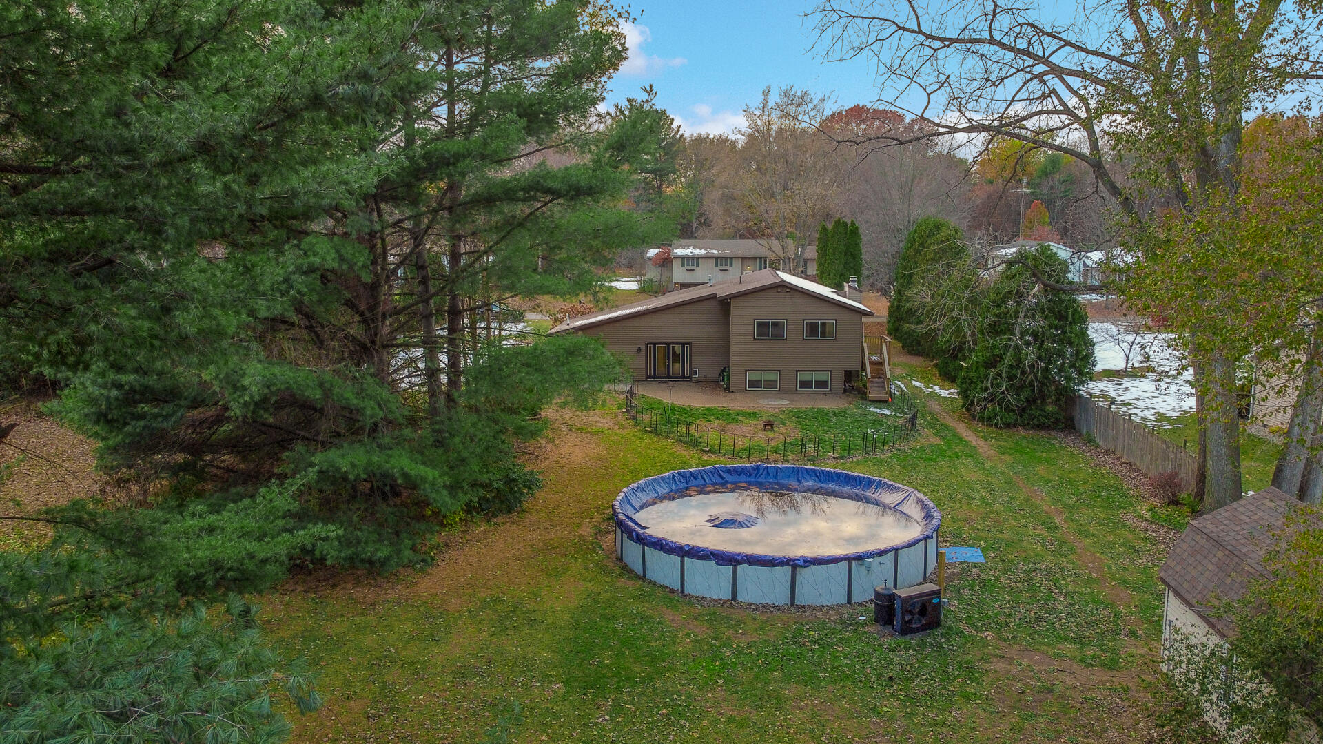6747 West 450 Road North Michigan City, IN 46360 - Photo 35 of 37 an aerial view of a house with garden space and trees
