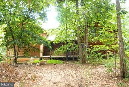 10677 River Road Rixeyville, VA 22737 - Photo 25 of 26 a backyard of a house with lots of green space