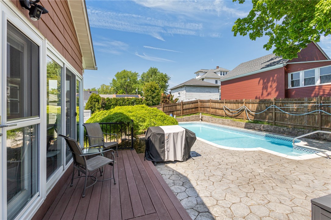 11 Bourassa Avenue Woonsocket, RI 02895 - Photo 14 of 39 Platform deck off the sunroom