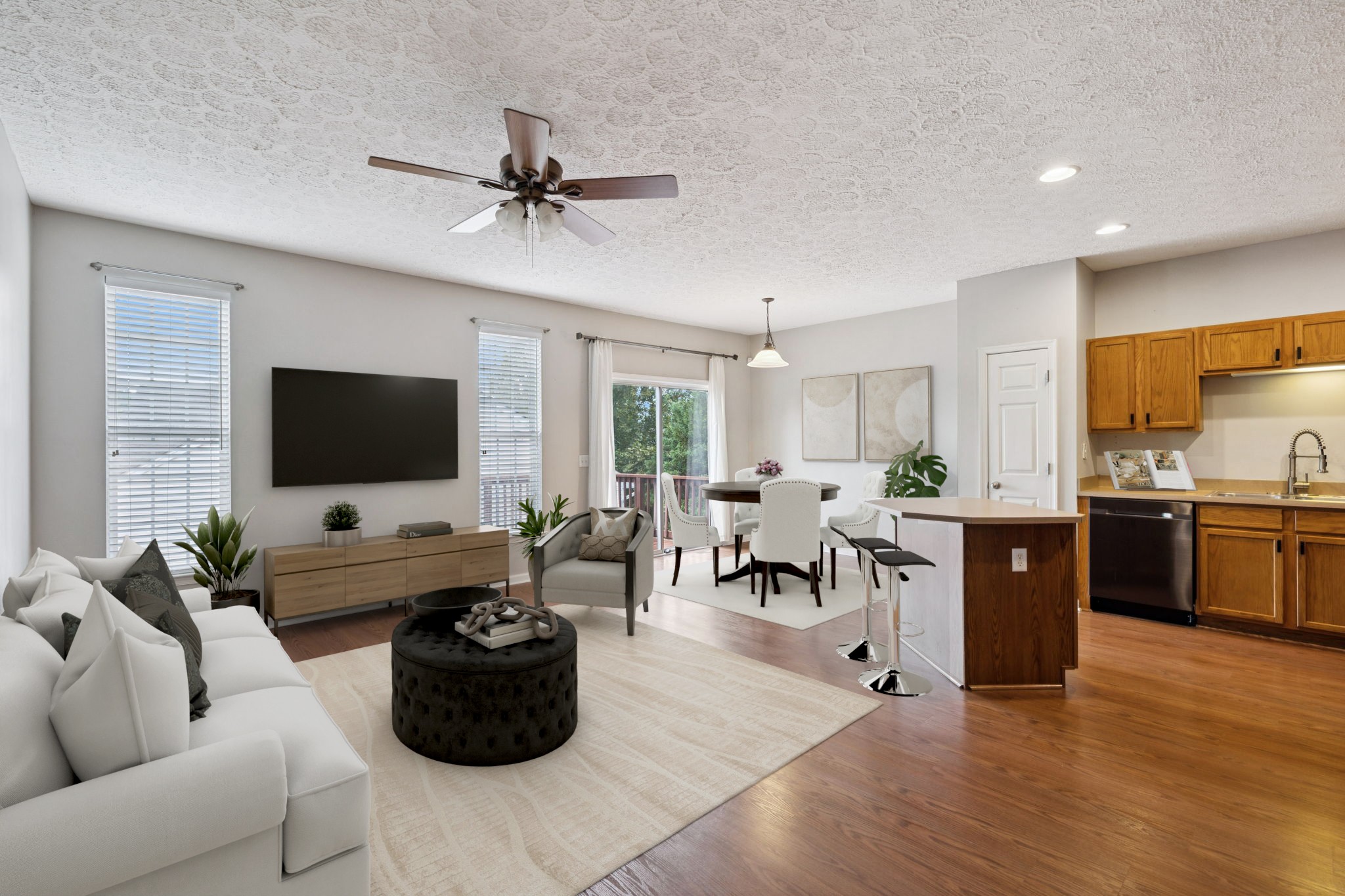 1345 Bell Road, Unit 412 Antioch, TN 37013 - Photo 6 of 34 a living room with furniture and a flat screen tv